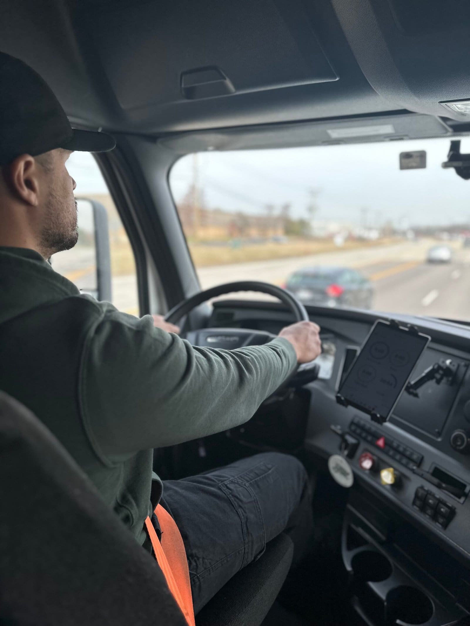 truck driver in the semi truck cabin