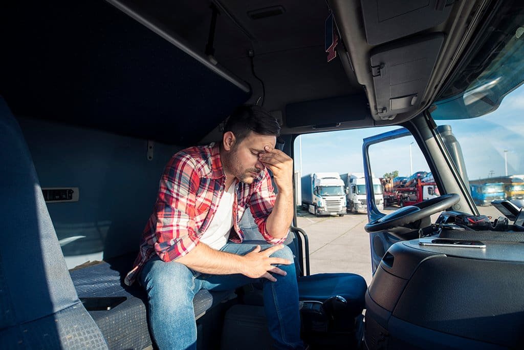 a man sitting in a truck