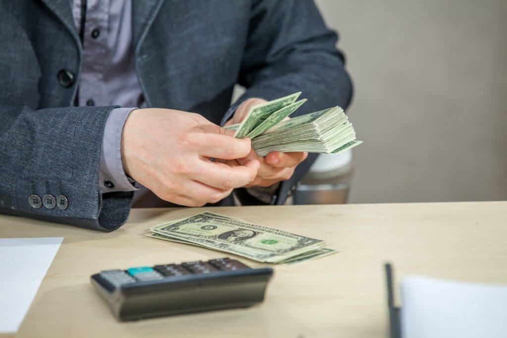 businessman counting money
