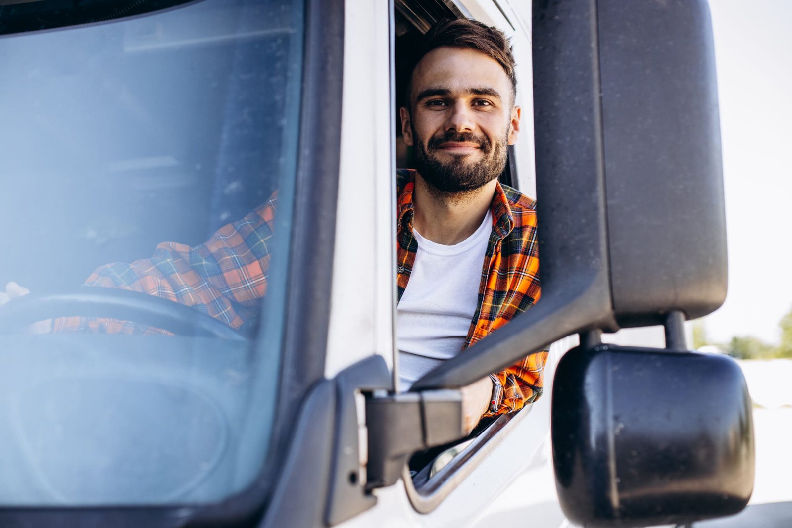 trucker sitting in a cabin